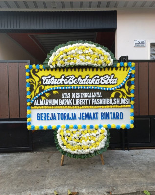 Papan Bunga Duka di Batu Plat
